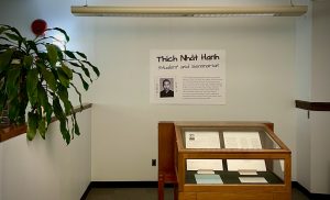 The small case roughly 3' by 5' showing reproductions of archival documents related to the life of Thich Nhat Hanh