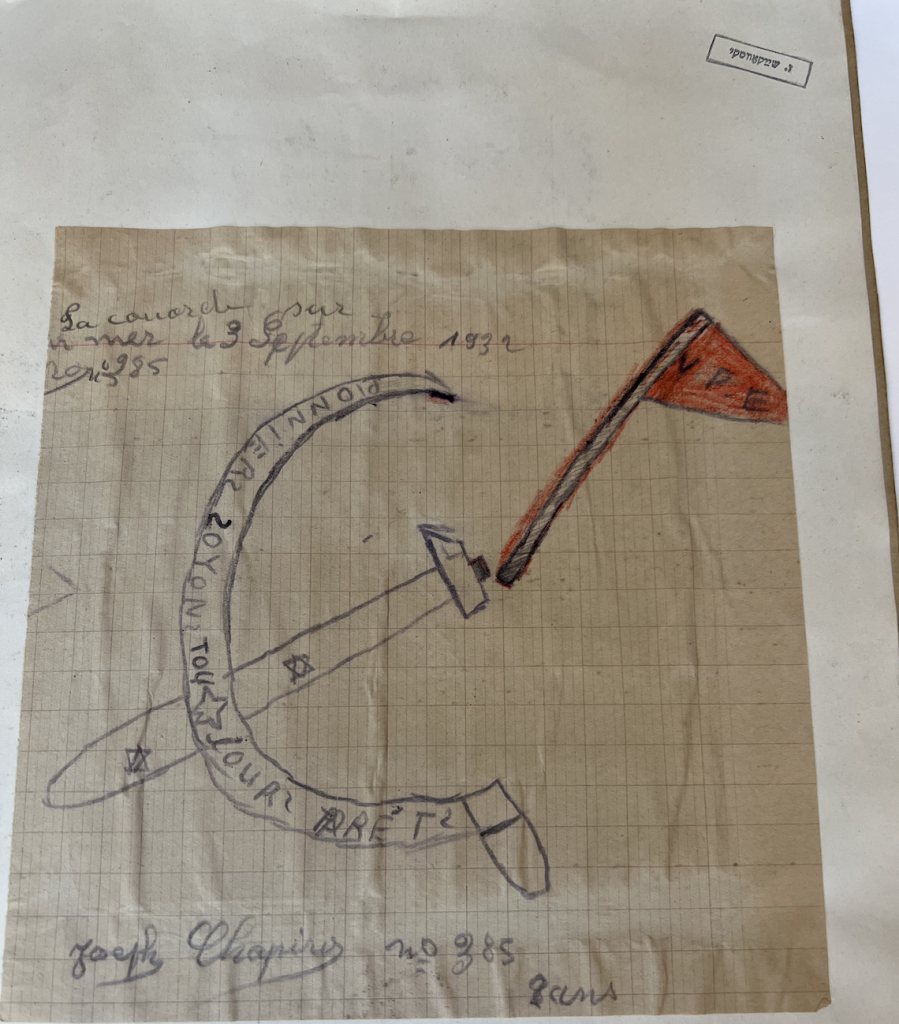 Child's drawing of a hammer and sickle and a red flag