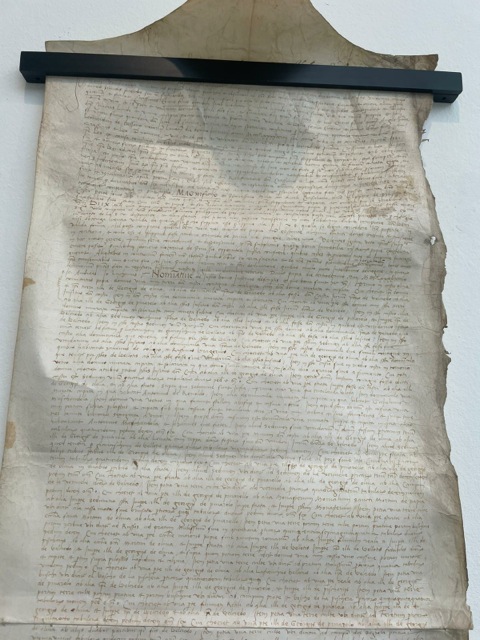 Long roll of parchment with text