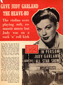 The second page of a two-page spread in a celebrity gossip magazine. The text is framed by a photograph of Judy Garland's head and shoulders, her expression equal parts guilty and rebellious, above another photograph of concertgoers lined up outside a theater for an "IN PERSON JUDY GARLAND ALL STAR SHOW." The article is subtitled, "The violins were playing soft, romantic music but Judy was on a rock 'n' roll kick."